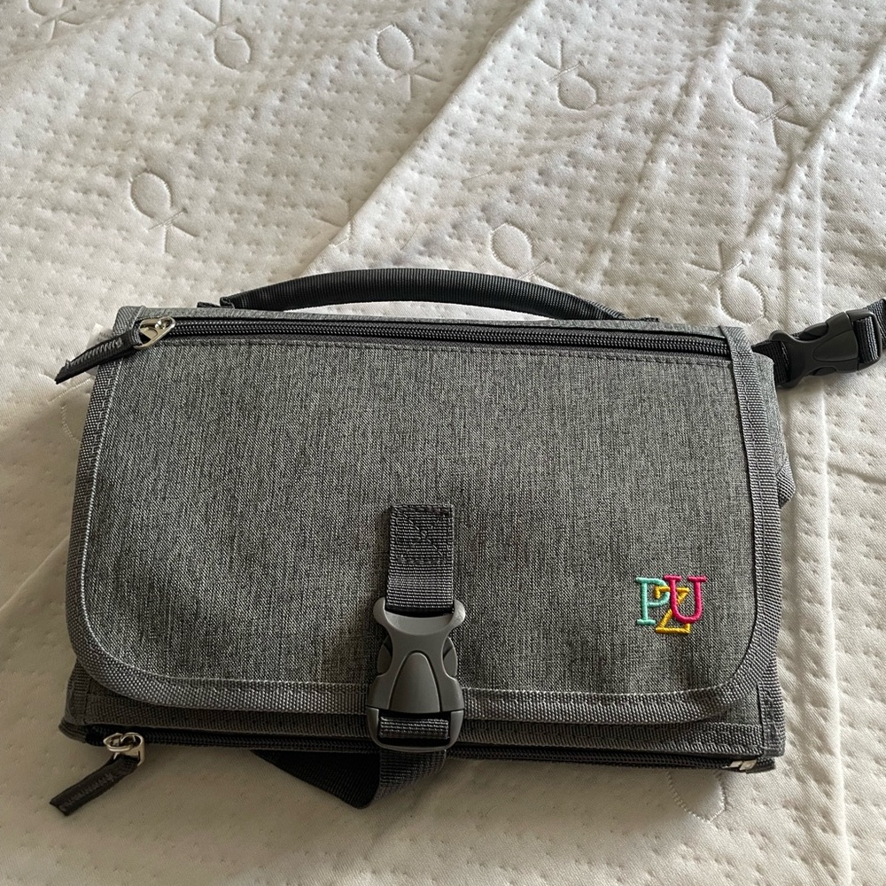Portable diaper changing pad